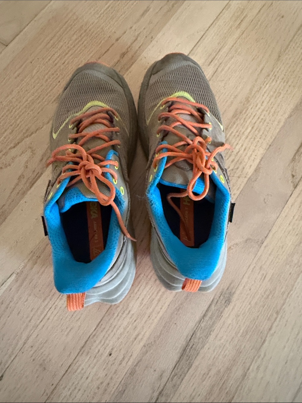 Hoka Kids Tan Sneakers with Bright Blue Lining and Orange Laces